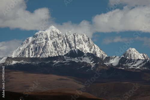 View of Holy Yala Mountain on the border of Kangding, in Sichuan Province, China. The top of the mountain is covered with snow seen from Xinduqiao town.