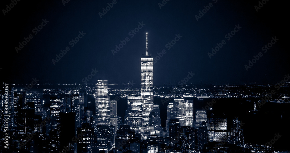 Blue Perspective of Breathtaking Panoramic and Aerial View of Manhattan, New York City at Night. Beautiful, Illuminated, Futuristic Buildings. Freedom Tower, Lady Liberty