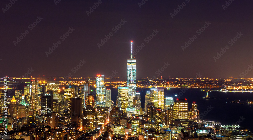 Breathtaking Panoramic and Aerial View of Manhattan, New York City at Night. Beautiful, Illuminated, Futuristic Buildings. Freedom Tower, Lady Liberty