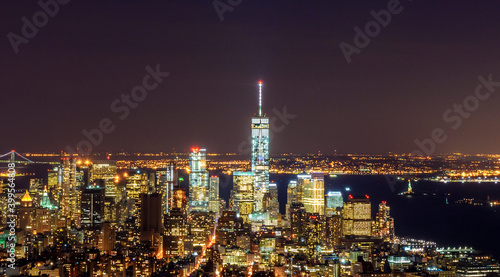 Breathtaking Panoramic and Aerial View of Manhattan  New York City at Night. Beautiful  Illuminated  Futuristic Buildings. Freedom Tower  Lady Liberty