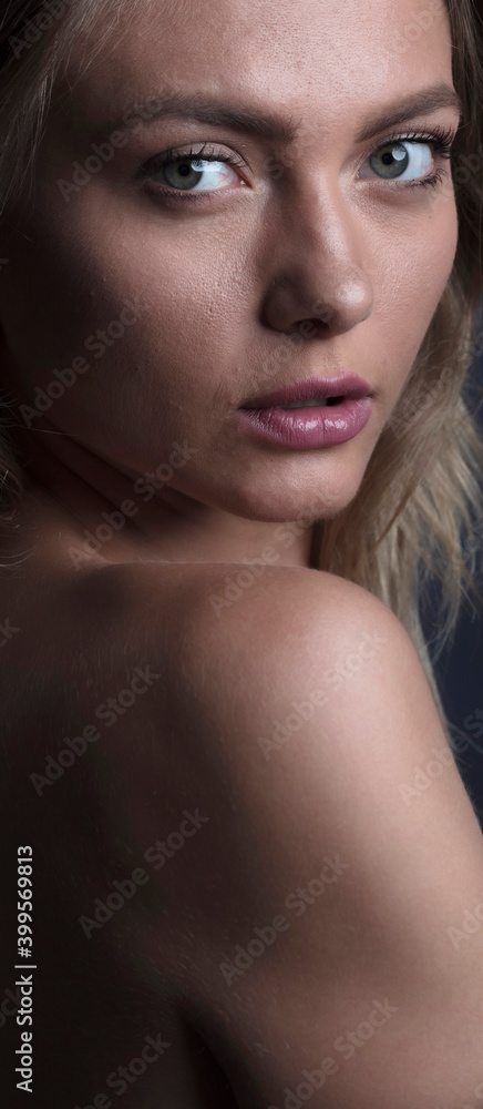 studio portrait of a young woman studio portrait of a young woman