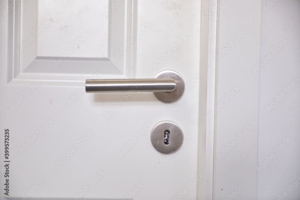 Metal Handle and Keyhole on Wooden Door Metal Handle and Keyhole on Wooden Door