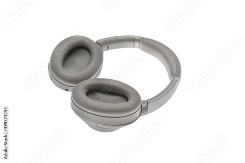 new modern gray wireless headphones, audio studio device isolated