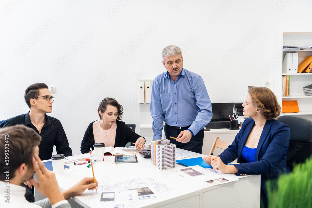 A business meeting with a senior manager. A business meeting with a senior manager.