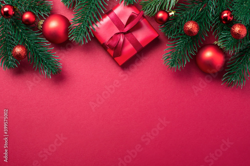 Christmas flat lay background or template with a red color gift box
