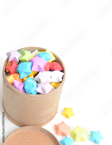 Origami stars full out of cardboard jar