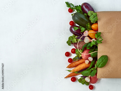 Frame of various isolated vegetables on white background, top view. Frame of organic food with space for text.