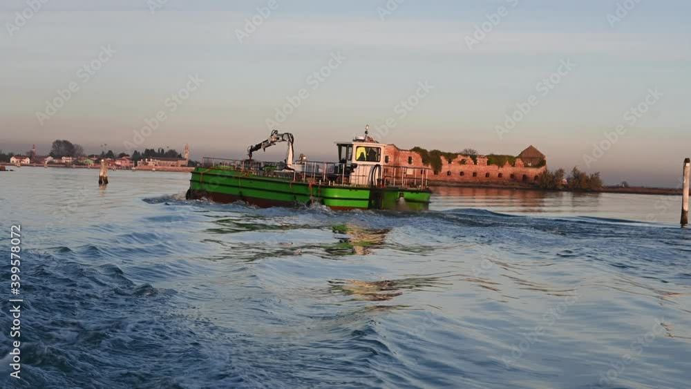 Venice, Italy - December 2020 - sailing among the islands of the Venetian lagoon Venice, Italy - December 2020 - sailing among the islands of the Venetian lagoon