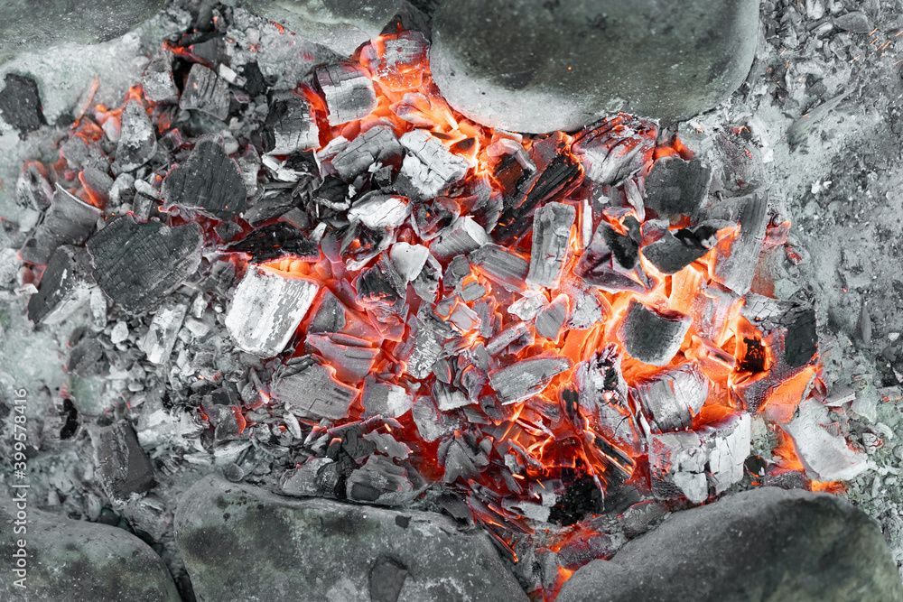 Hot coals from a burning fire