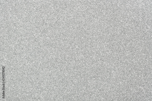 Silver paper texture or smooth gray noise background.