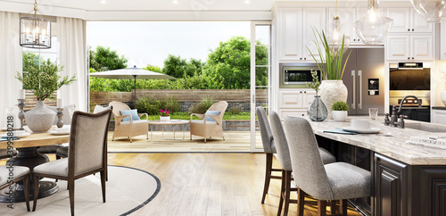 Obraz na plátně Beautiful open plan kitchen and dining area with patio doors to the garden