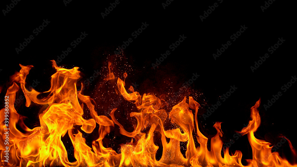fire flames with sparks on a black background, close-up fire flames with sparks on a black background, close-up