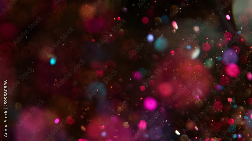 Abstract Neon Glitters Background with Bokeh Defocused Lights
