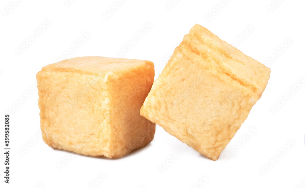 close-up of a pile of diced fish tofu isolated white background with clipping path close-up of a pile of diced fish tofu isolated white background with clipping path