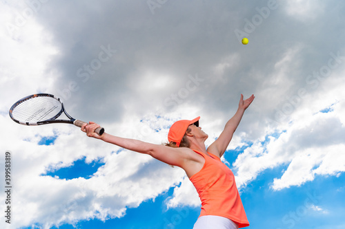 tennis serve by a young woman on the court © edojob