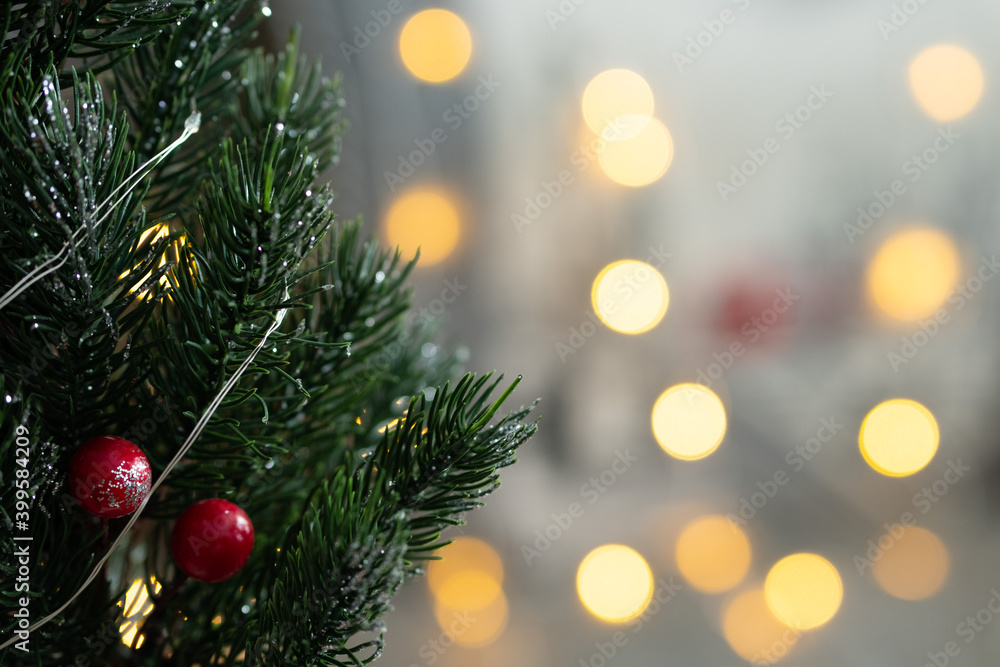 Christmas background. Christmas tree. Bokeh background. Blurred selective focus.