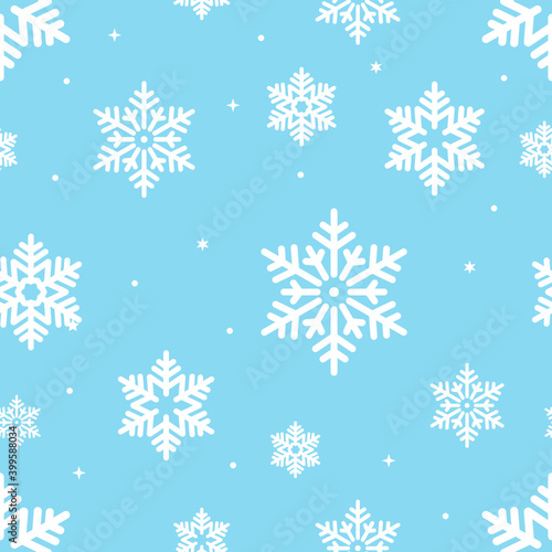 Snowflake seamless pattern. White and blue color theme. Vector Christmas winter background