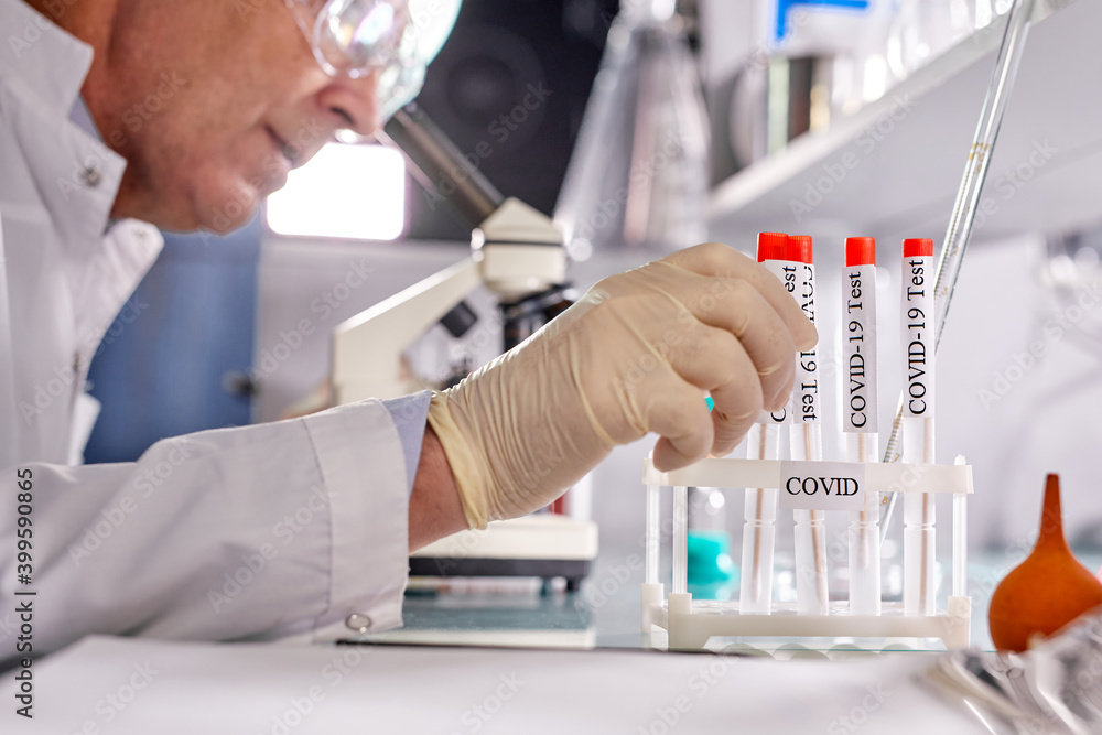 senior laboratory scientist conducting a research trying to make coronavirus disease treatment, professional professor chemist use modern technology for research senior laboratory scientist conducting a research trying to make coronavirus disease treatment, professional professor chemist use modern technology for research