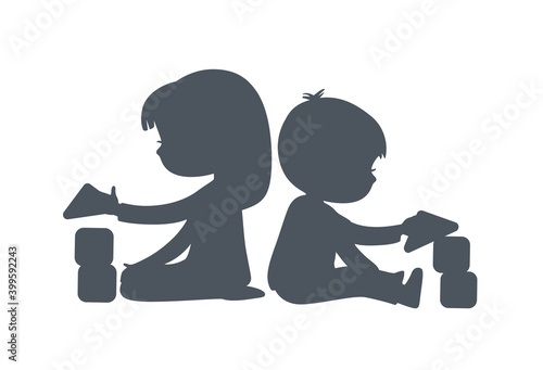 Silhouette of Boy and Girl playing with toy blocks. Can be used as logo or sign. Vector simple black and white illustration. isolated.