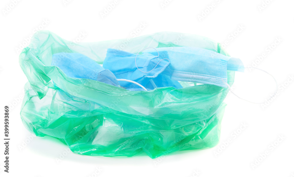 Fototapeta premium Garbage bag with medical masks.