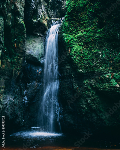 waterfall in sandstone mountains