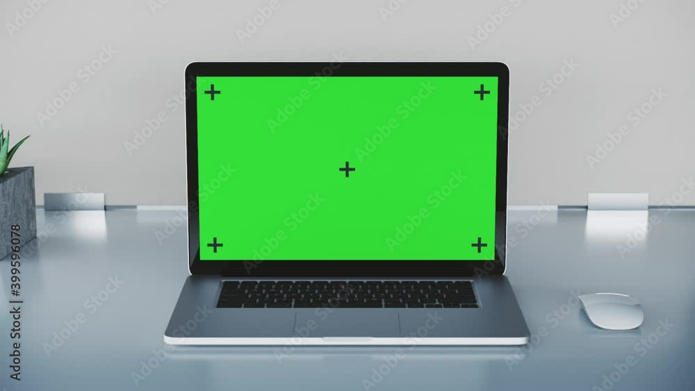 Zoom out of laptop on office desk with green screen Zoom out of laptop on office desk with green screen