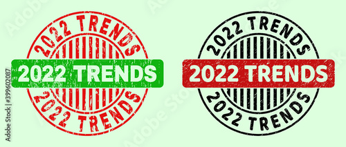 2022 TRENDS bicolor round watermarks with grunged surface. Flat vector distress watermarks with 2022 TRENDS caption inside round shape, in red, black, green colors. Round bicolor seal stamps.