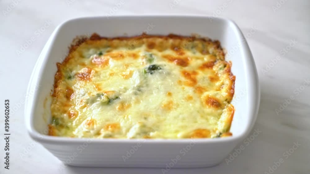 baked spinach lasagna with cheese in white plate baked spinach lasagna with cheese in white plate