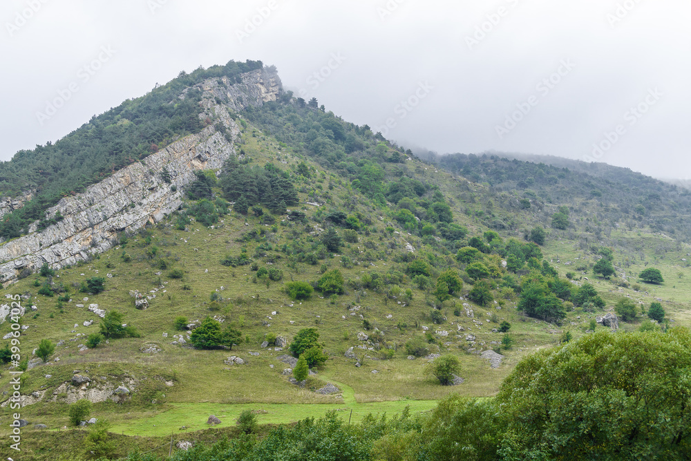 Cloudy view of mountains of Dzivgis village in North Osetia Alania, North Caucasus, Russia