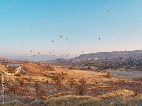 Hot air balloon in Cappadocia on the sunrise.