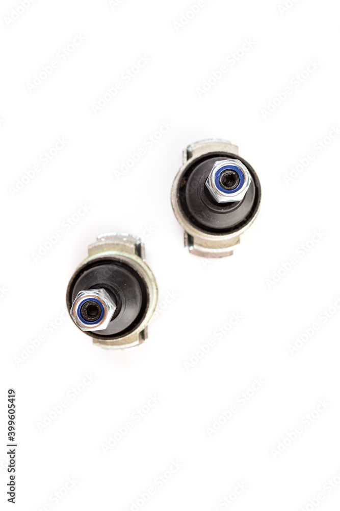 ball joint on a white background, car suspension detail, concept of repair in a car service. Top view, photograph with depth of field ball joint on a white background, car suspension detail, concept of repair in a car service. Top view, photograph with depth of field