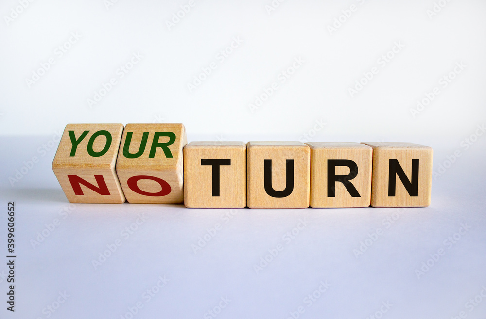 It is your turn symbol. Turned a cube and changed words 'no turn' to 'your turn'. Business and your turn concept. Beautiful white background, copy space. It is your turn symbol. Turned a cube and changed words 'no turn' to 'your turn'. Business and your turn concept. Beautiful white background, copy space.