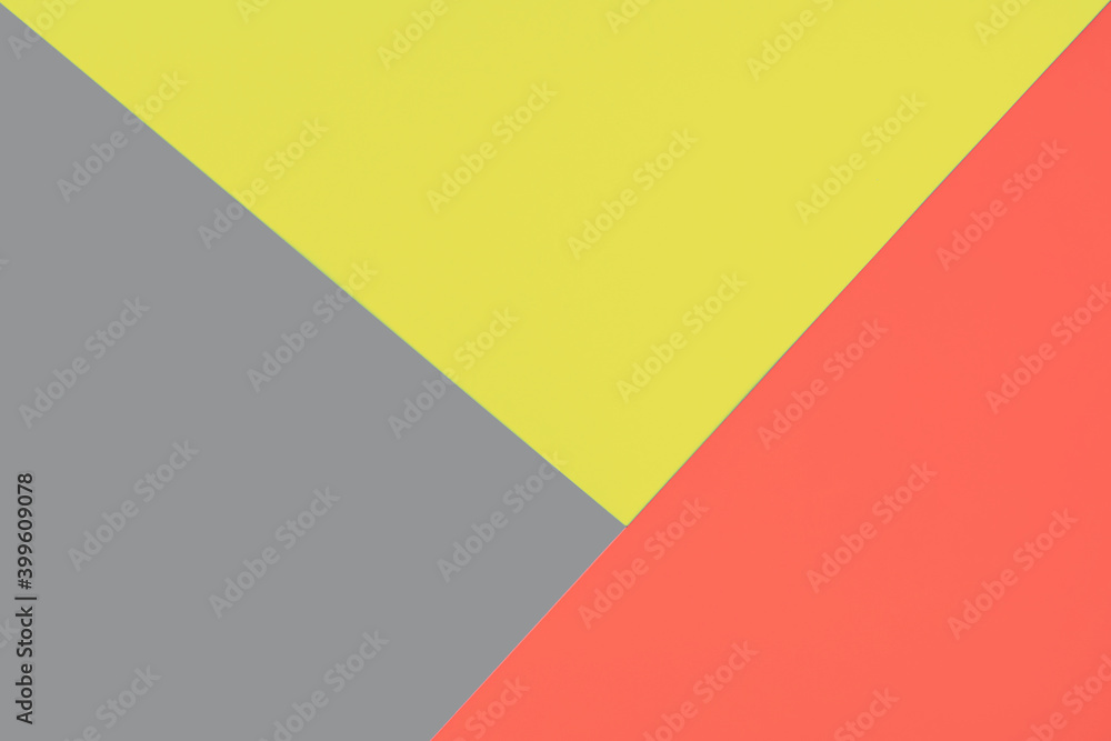 Three-color background in bright colors. Pastel colors of yellow, gray and coral.