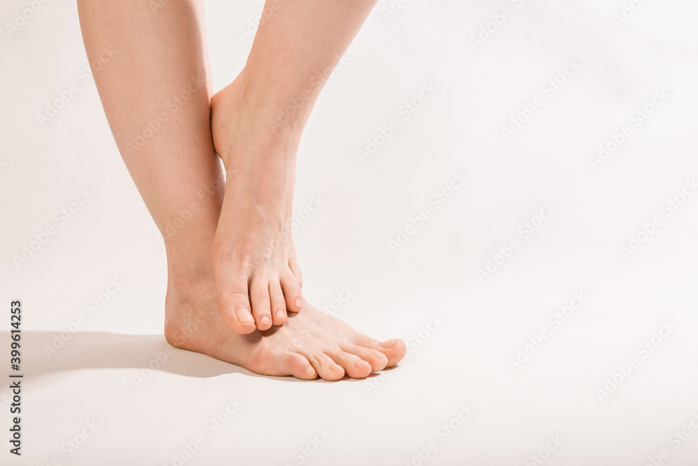 feet on a white background one foot lifted feet on a white background one foot lifted