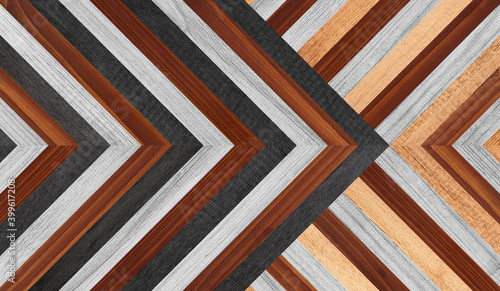 Wooden planks texture. Vintage colorful parquet floor with chevron pattern. 