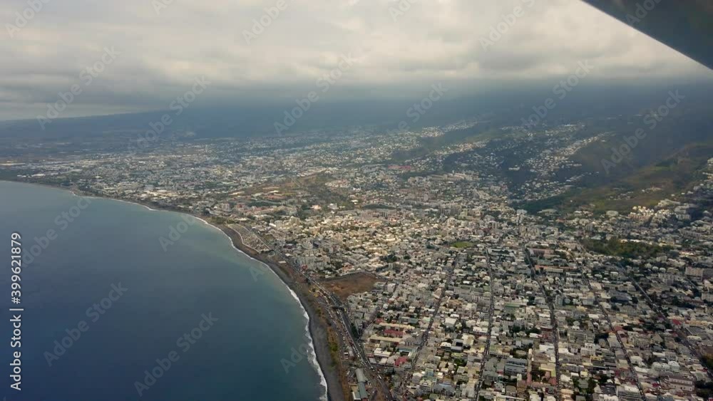 Aerial view of Saint Denis Reunion island under cloudy sky Aerial view of Saint Denis Reunion island under cloudy sky