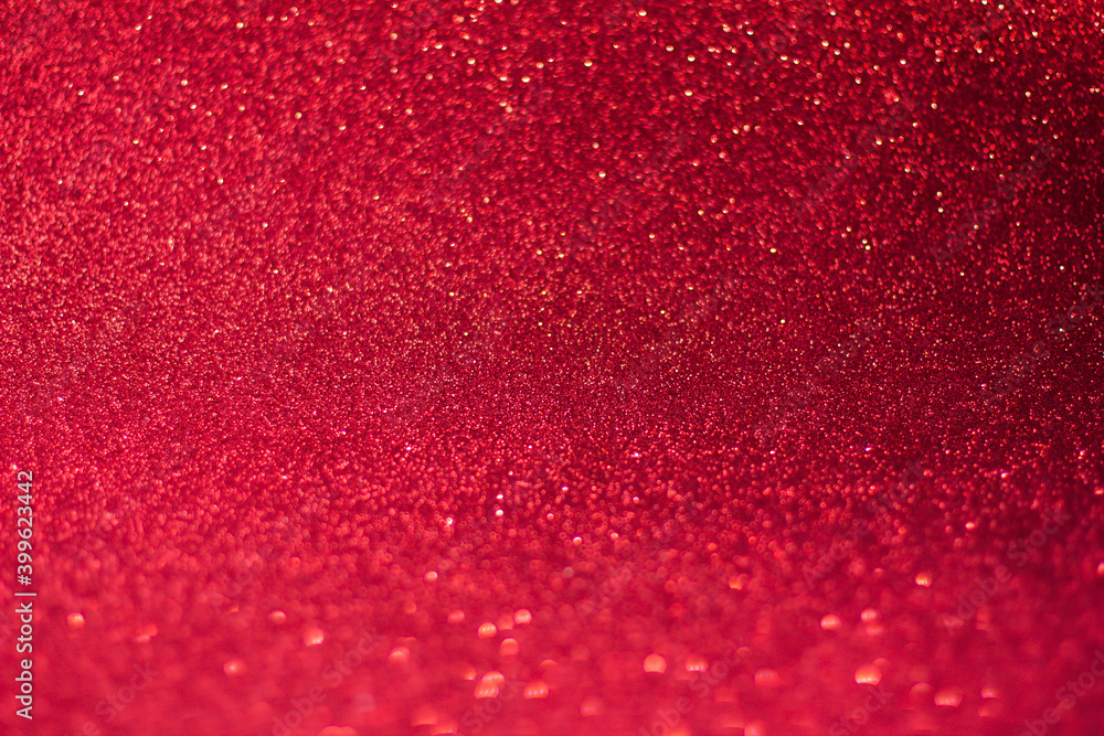 Red background with bokeh and glitter, valentine's day, Christmas and new year background soft focus