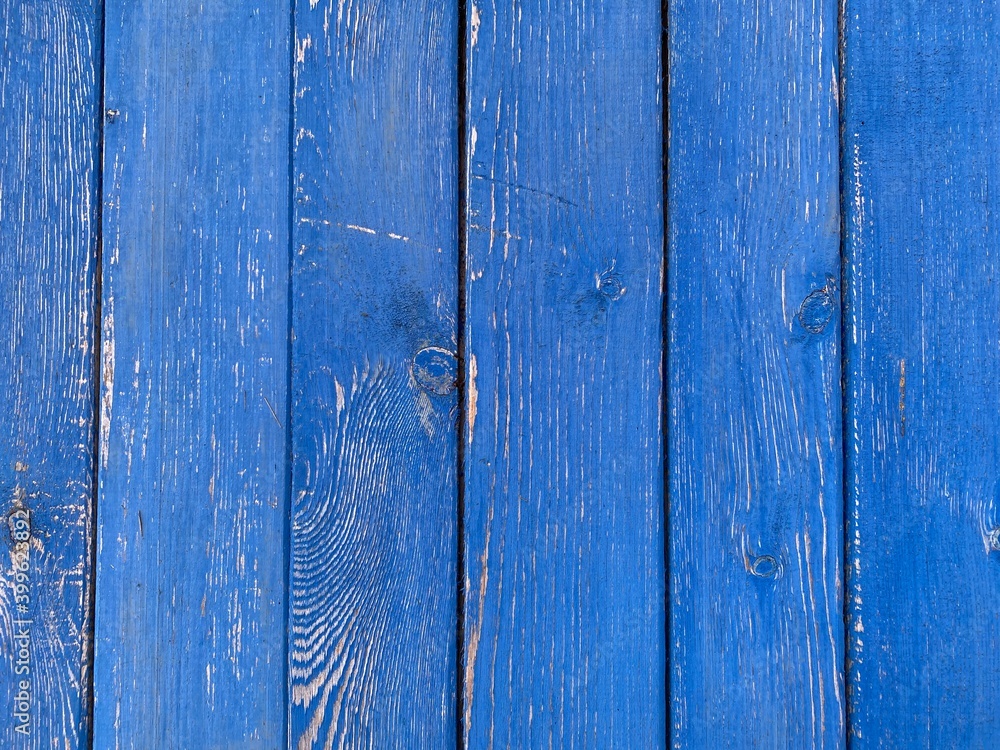 blue wooden background. boards painted with blue paint. blue wooden background. boards painted with blue paint.