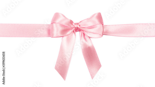 Beautiful pink ribbon with bow isolated on white background.