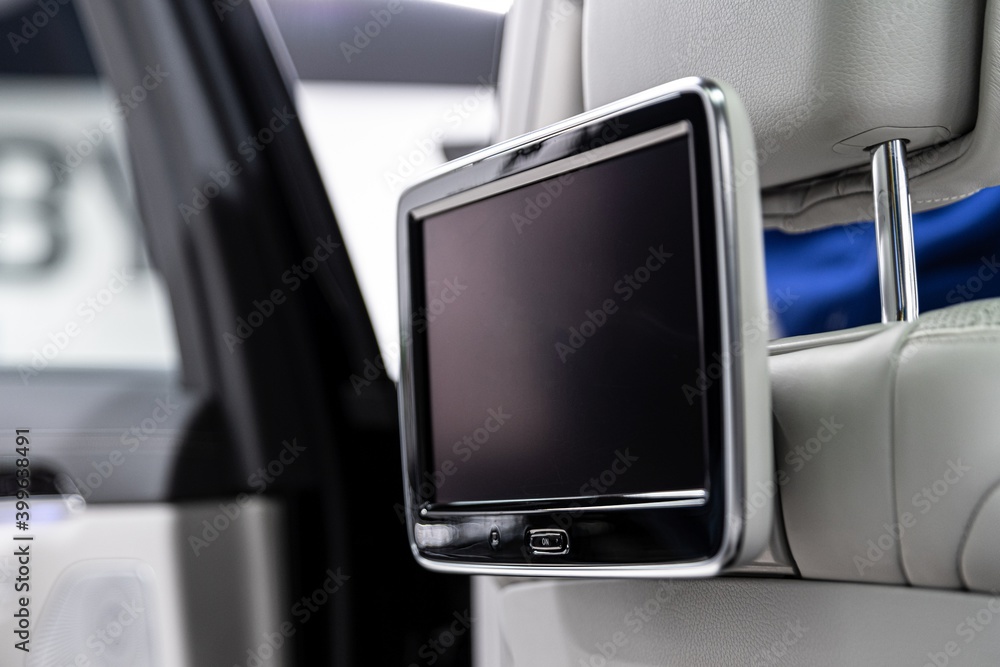 Modern luxury car interior with empty touchscreen monitor with copy space. Modern luxury car interior with empty touchscreen monitor with copy space.