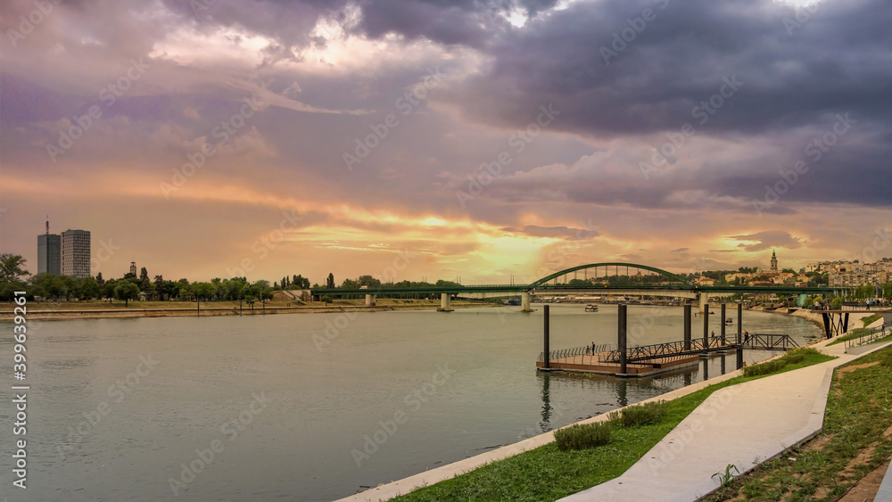 Sava river with bridges, buildings and beautiful sunset. View on Sava river on New Belgrade and Old Belgrade.