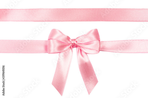Murais de parede Beautiful pink ribbon with bow isolated on white background.