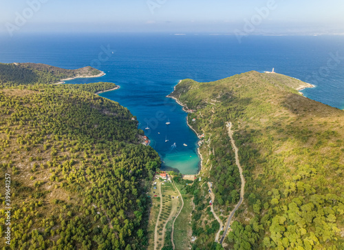 Aerial view of Stoncica bay and beach with sailing boats on the island of Vis, Dalmatia, Croatia. photo