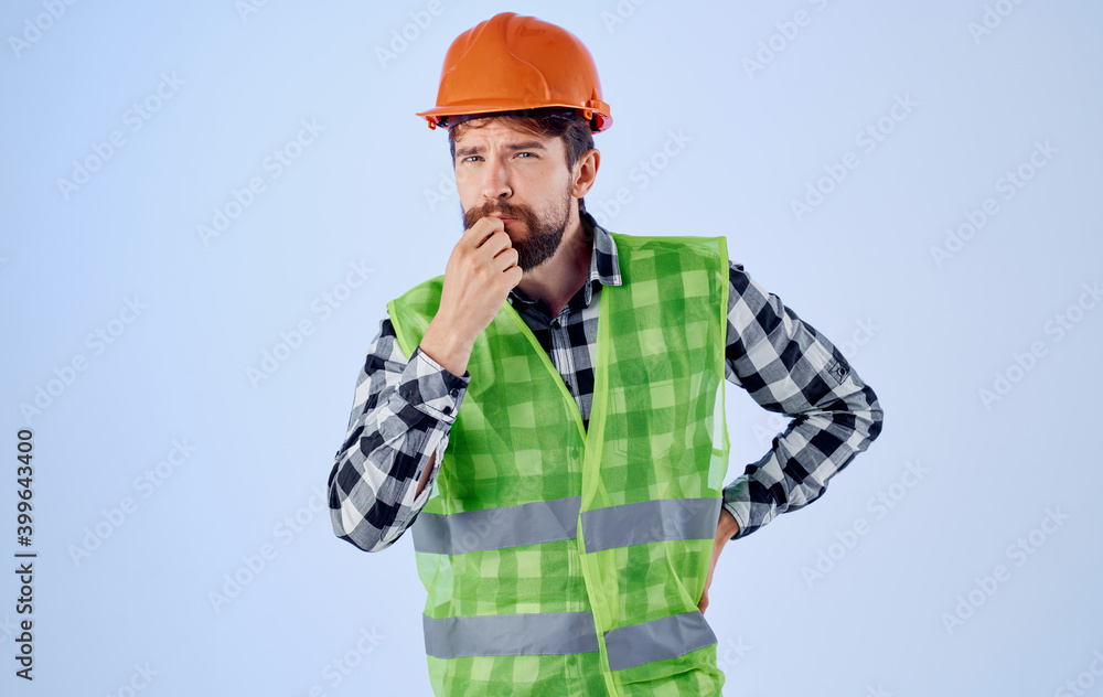 Emotional Builder is gesturing with his hands an orange helmet reflective vest Emotional Builder is gesturing with his hands an orange helmet reflective vest