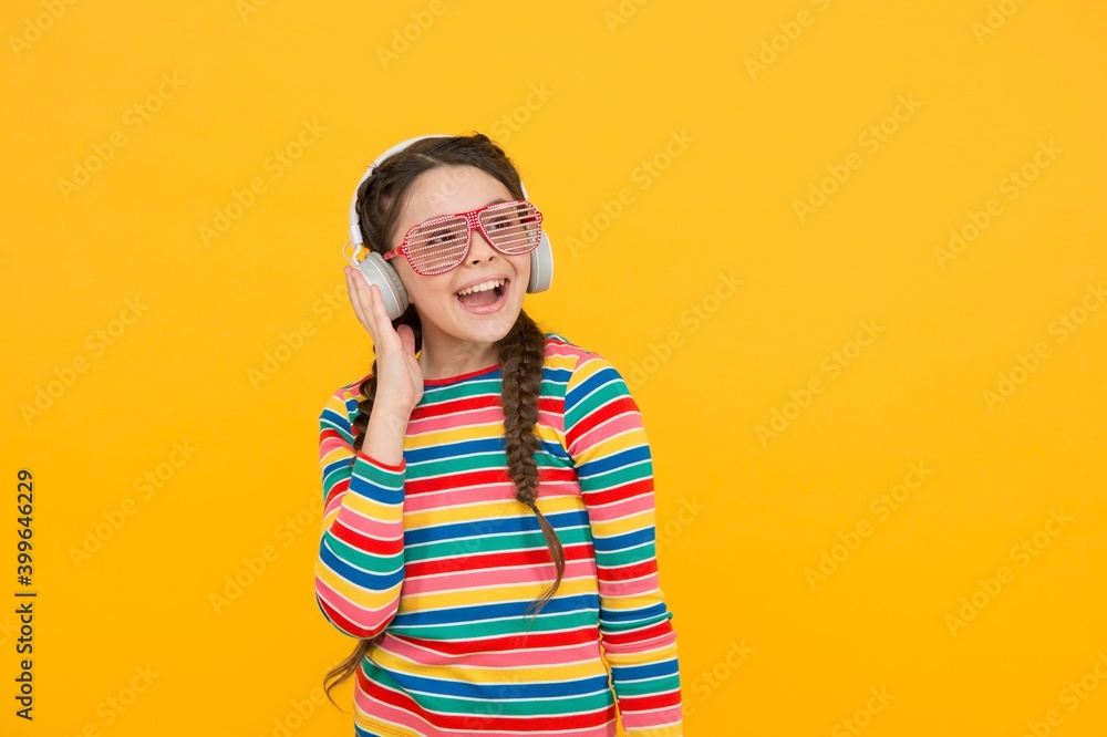 Happy learning. modern life. child wear party glasses. happy childhood. just having fun. her favorite song. teenage girl listen music in earphones. pretty kid with braided hair. glamour and funny Happy learning. modern life. child wear party glasses. happy childhood. just having fun. her favorite song. teenage girl listen music in earphones. pretty kid with braided hair. glamour and funny