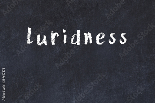Photos Black chalkboard with inscription luridness on in