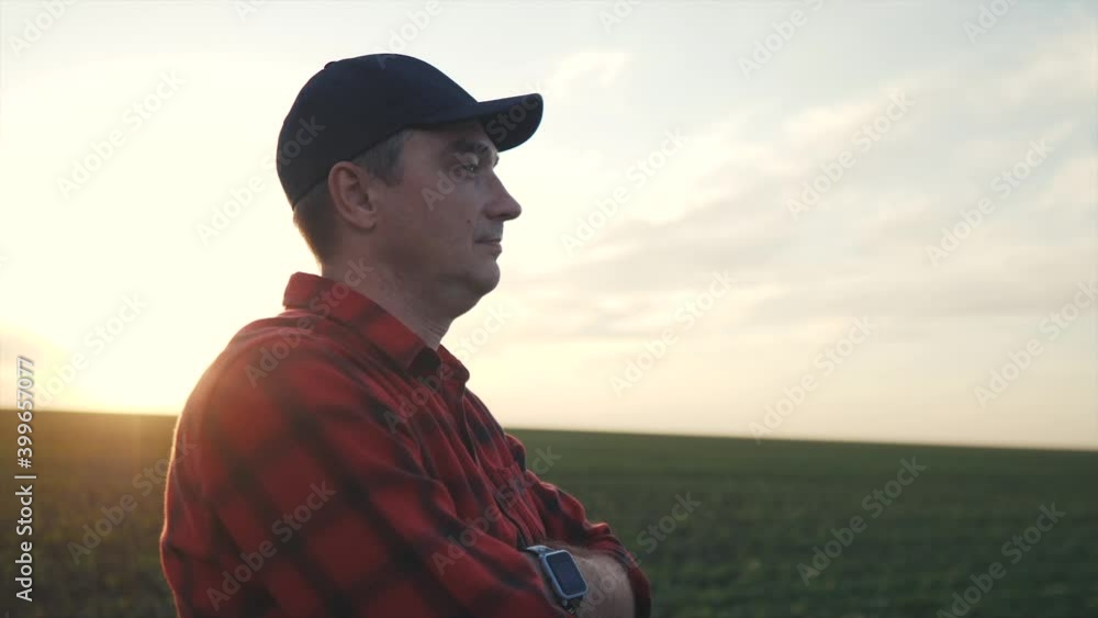 agriculture. farmer face crop portrait in field at harvest. agribusiness agriculture a harvesting concept. working farmer portrait stands in the field resting during the harvest agriculture. farmer face crop portrait in field at harvest. agribusiness agriculture a harvesting concept. working farmer portrait stands in the field resting during the harvest
