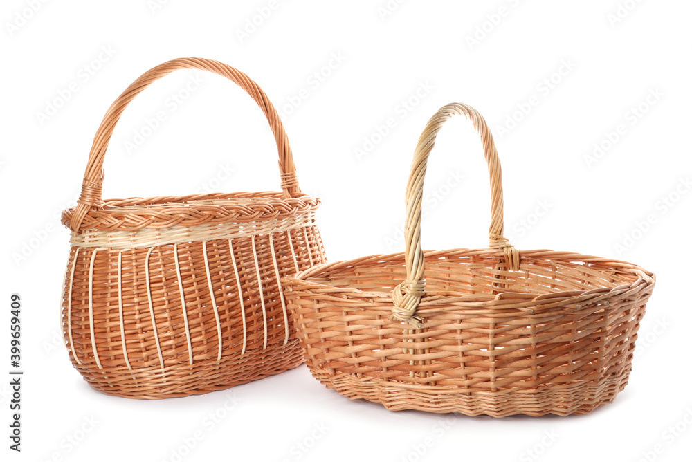 Two decorative wicker baskets on white background Two decorative wicker baskets on white background