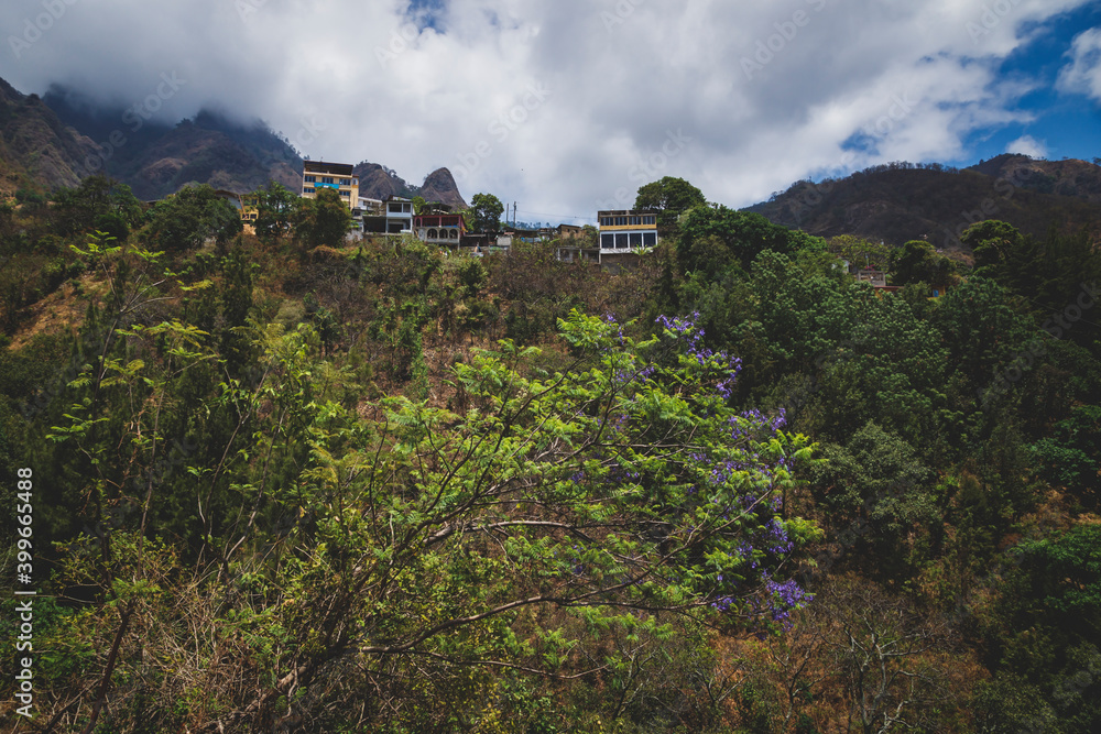 View up to steep mountain with the village of Santa Cruz la Laguna, Guatemala