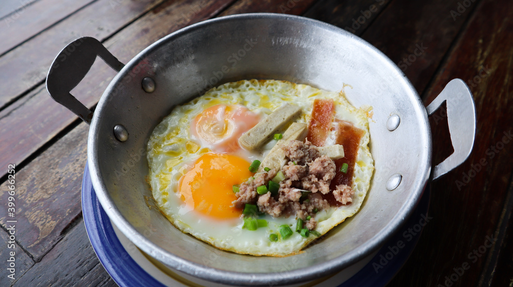 Homemade sunny side up pan-fried egg.